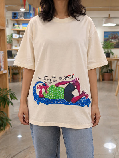 Oversized cream आराम (Aaram) printed T-shirt, worn at Alive Studio