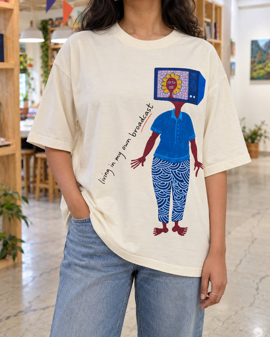 Oversized cream Broadcast printed T-shirt, worn at Alive Studio