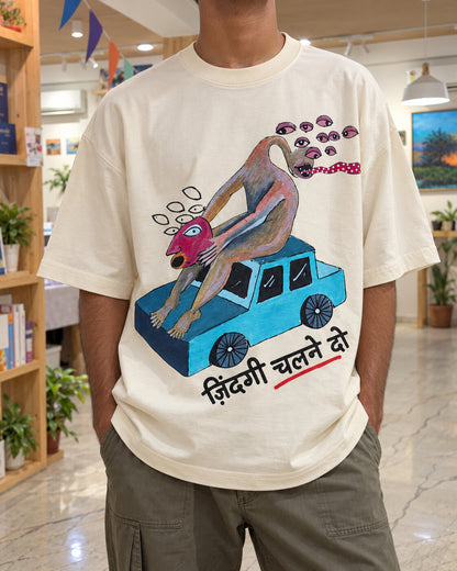 Oversized cream गाड़ी (Gaadi) printed T-shirt, worn at Alive Studio